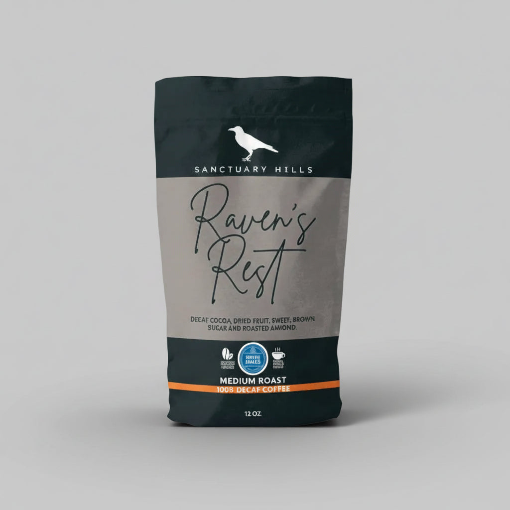 Coffee bag labeled 'Raven's Rest' from Sanctuary Hills on a gray background